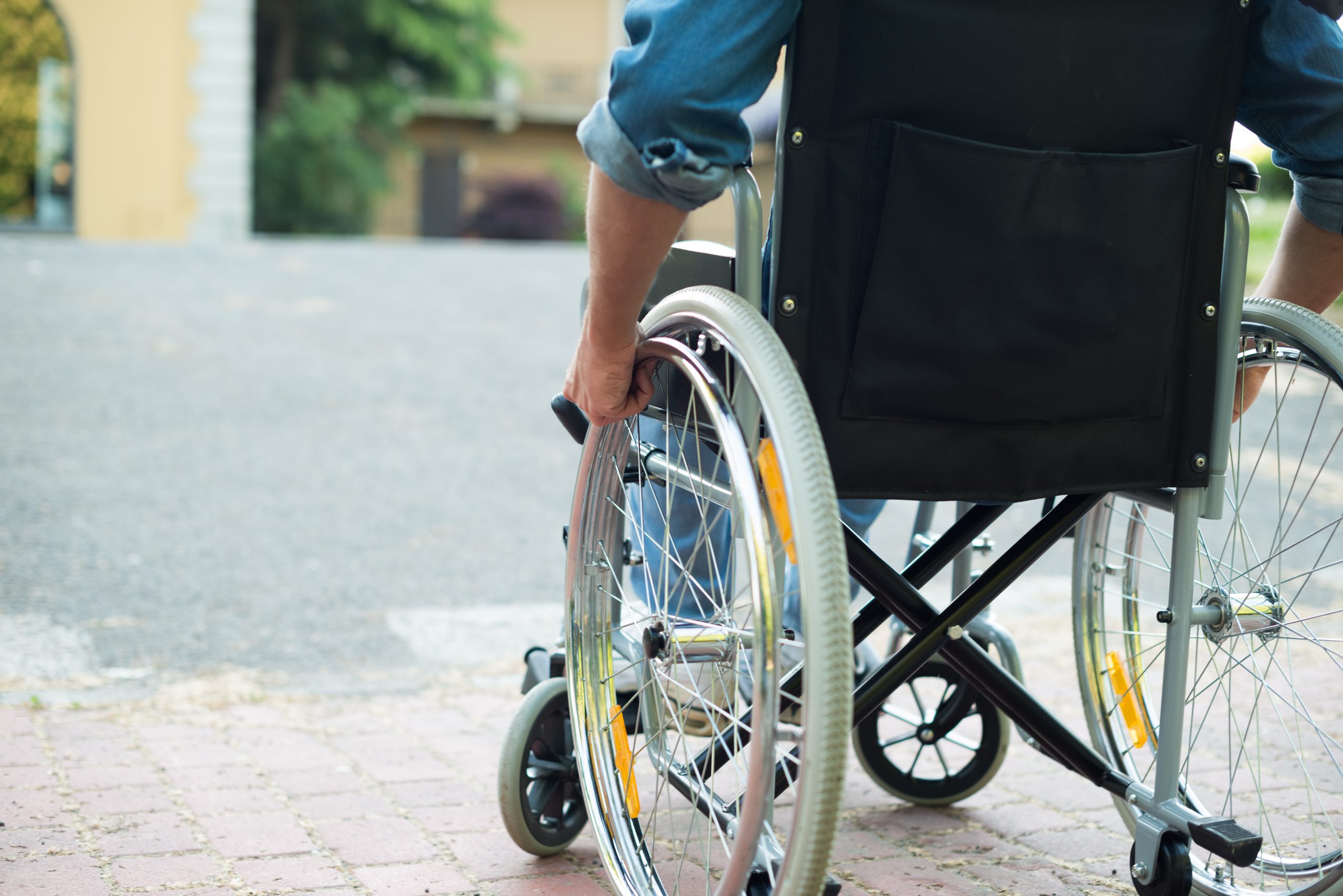 Disabled man trying to getting on a ramp